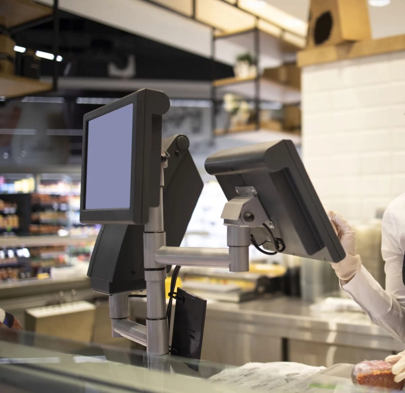 Solution modulaire au point de vente avec bras inclinable pour terminal de paiement
